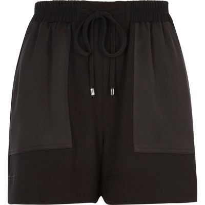 Black woven panel pocket shorts